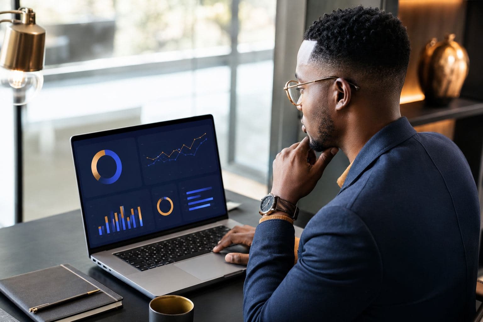 Reviewing applicant tracking data on a laptop